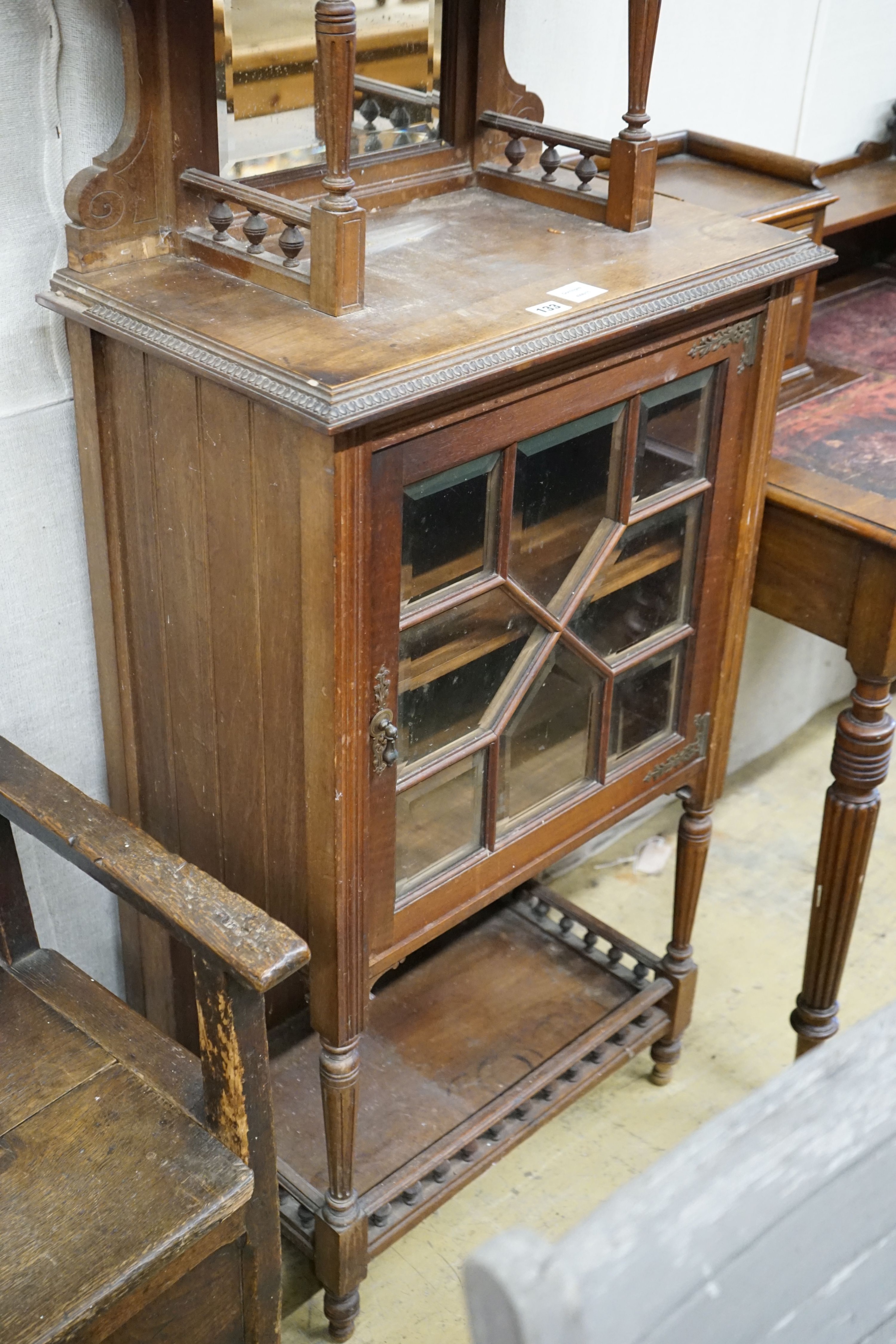 A late Victorian narrow mahogany display cabinet, width 60cm, depth 35cm, height 178cm